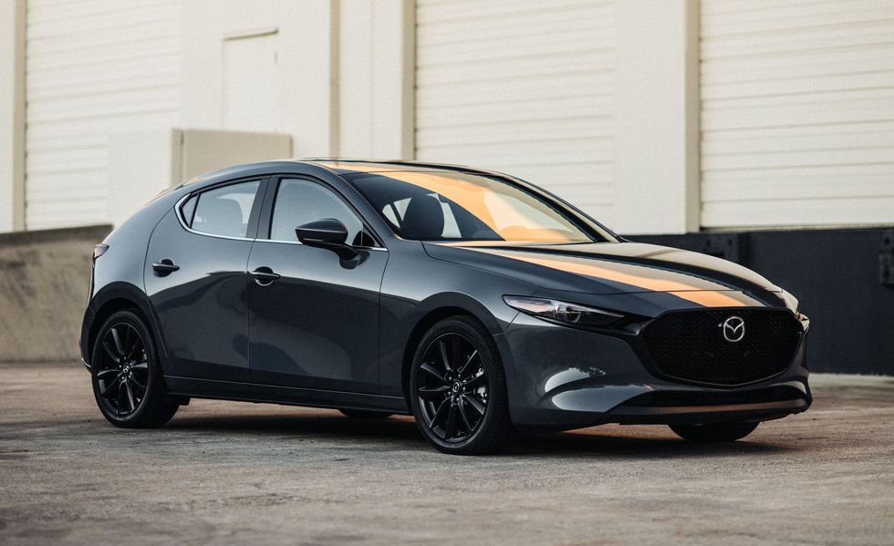 A photo of a large car with simple design.