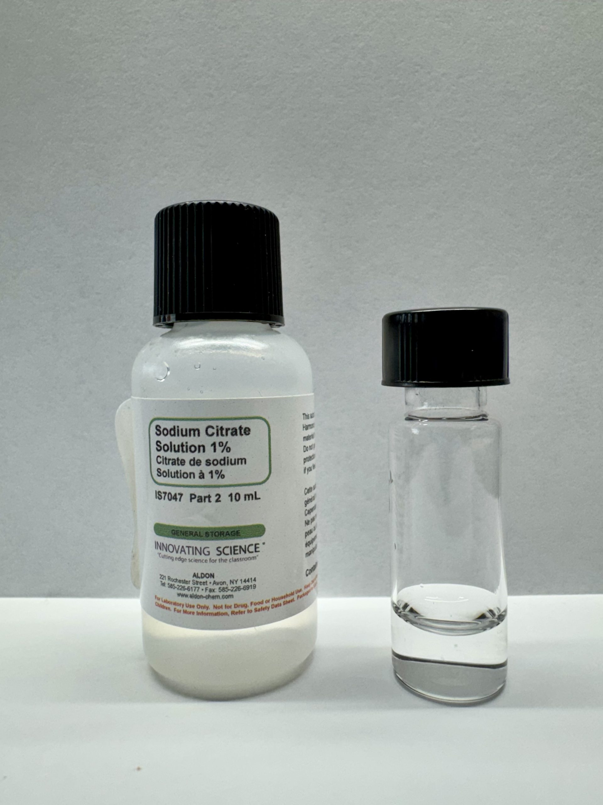 Sodium citrate solution, showing a transparent, colorless appearance.